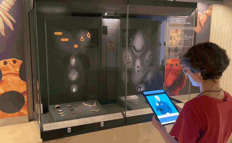 Figure 1: As soon as the app visually recognizes an exhibit, it can respond to user queries in sign language and retrieve related content in the same format.